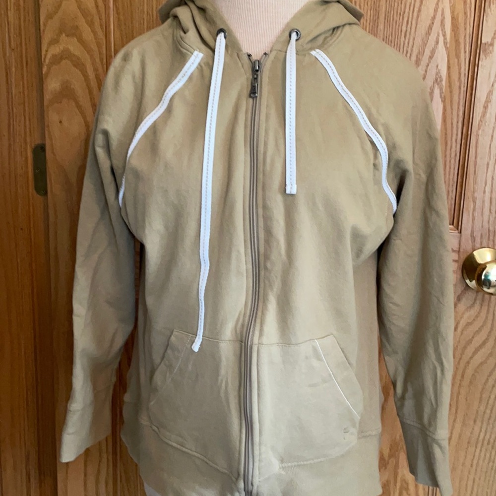 Danskin tan with white trim stretchy long sleeve zip down hoodie